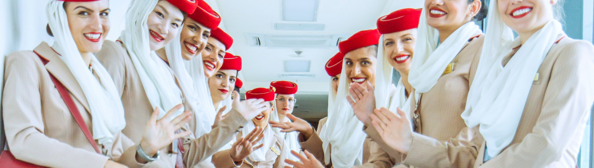 women in brown blazer and brown skirts, air hostesses