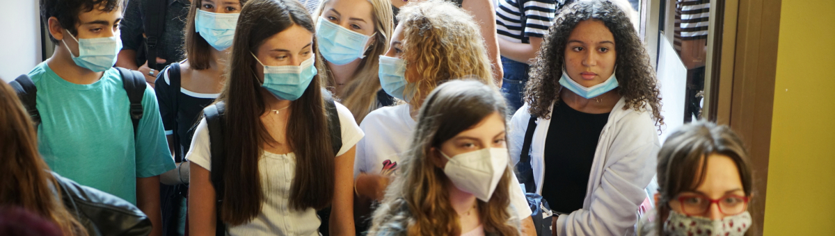 A group of high school students wearing face masks